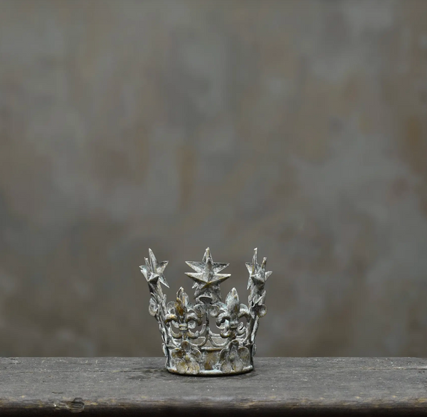Close-up of iron crown and tin detailing