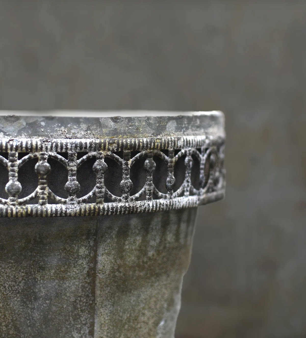 Close-up of hand-punched tin rim detail