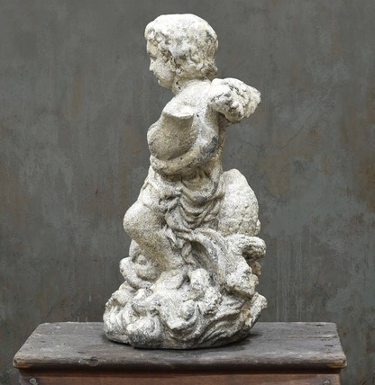Close-up of cherub statue face