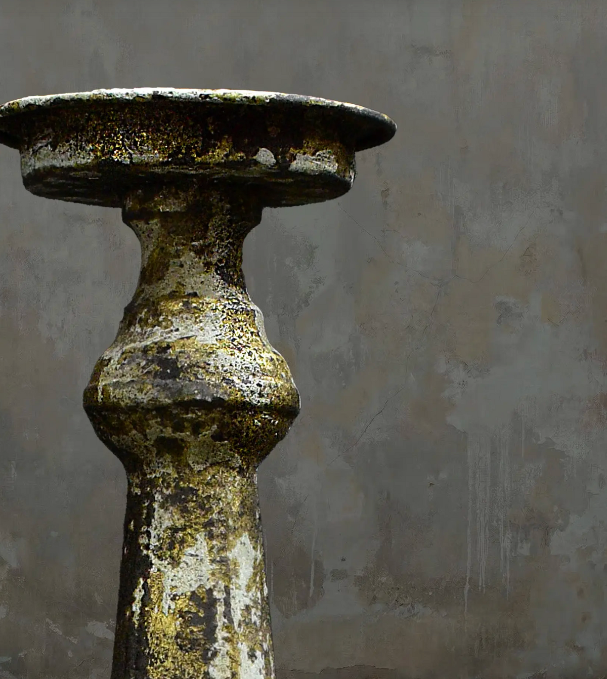 Gold candlestick with stepped base, front view