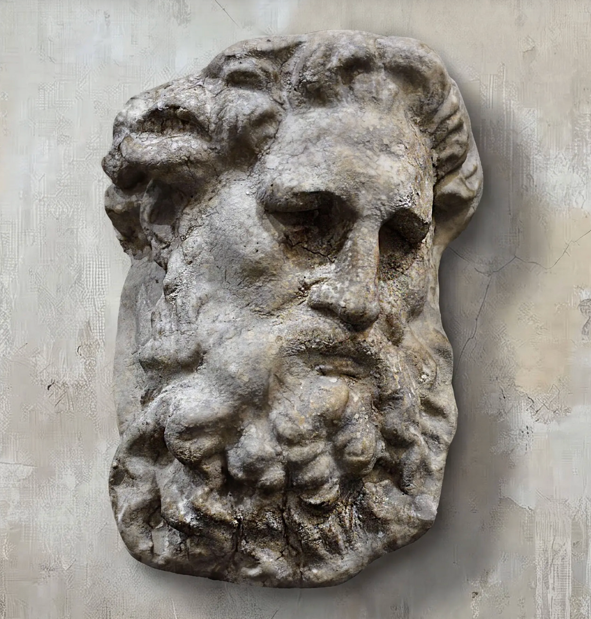 Lion wall plaque mounted flush against wall, front view