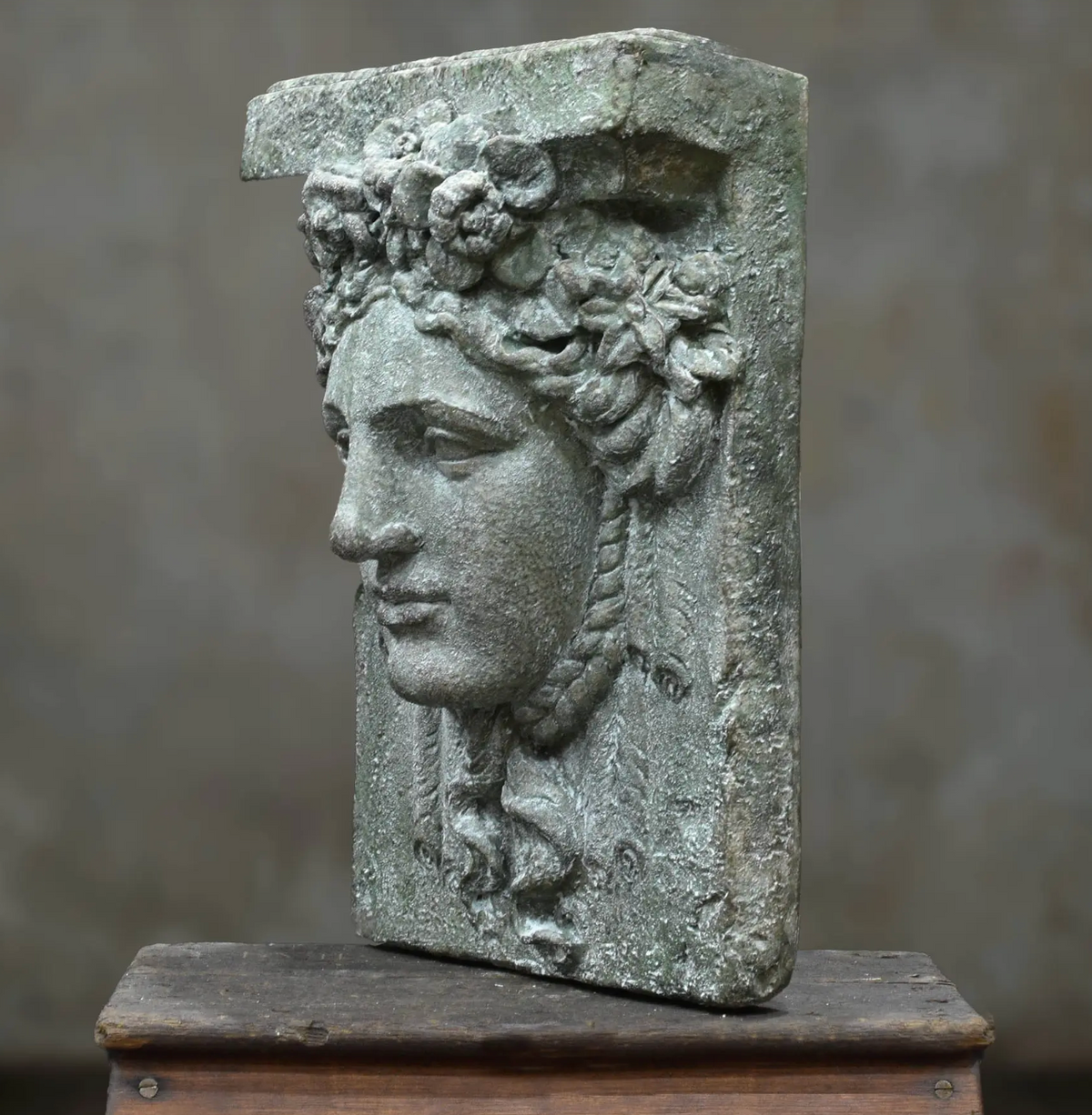 Close-up of Hermes wall plaque surface and relief
