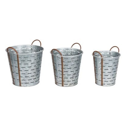 Three olive-toned zinc flower pots with handles, grouped view