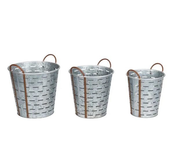 Three olive-toned zinc flower pots with handles, grouped view