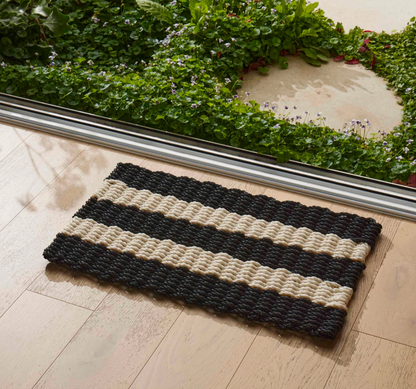 Black and cream striped rope door mat, full view