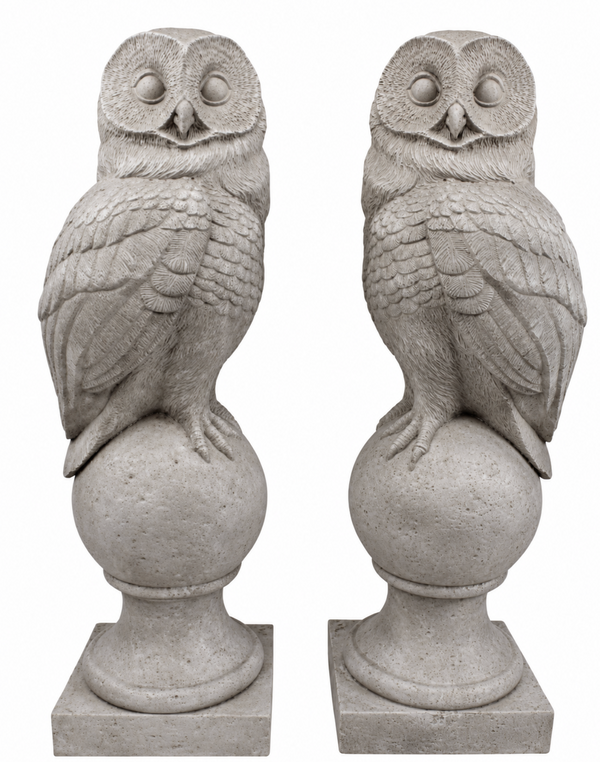 Pair of pale grey resin owl ball finials, showing left- and right-facing designs