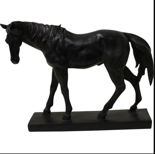 Black walking horse statue with a lowered head and detailed mane on an oblong base