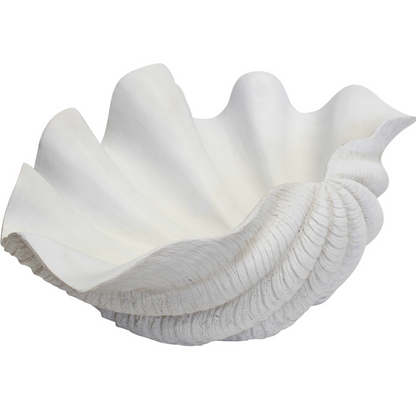 Giant white resin clam shell showing scalloped front edge and open interior