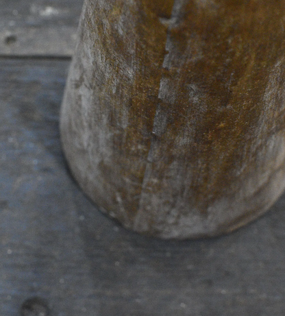 Close-up of aged gold finish at the star and base join