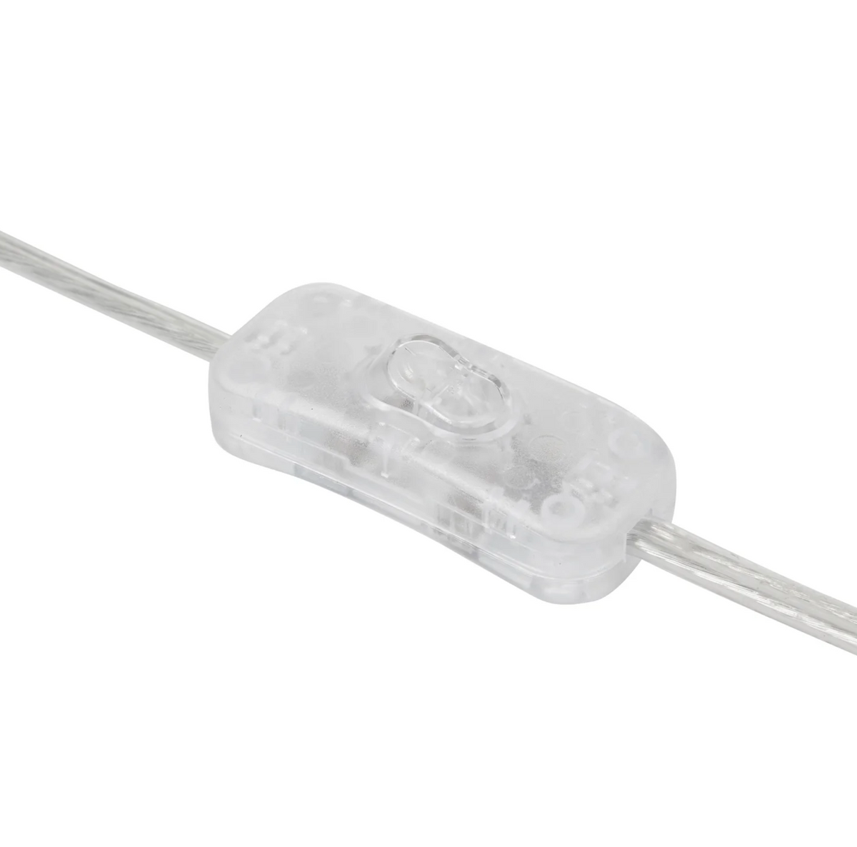 Close-up of the table lamp's clear inline switch and cord