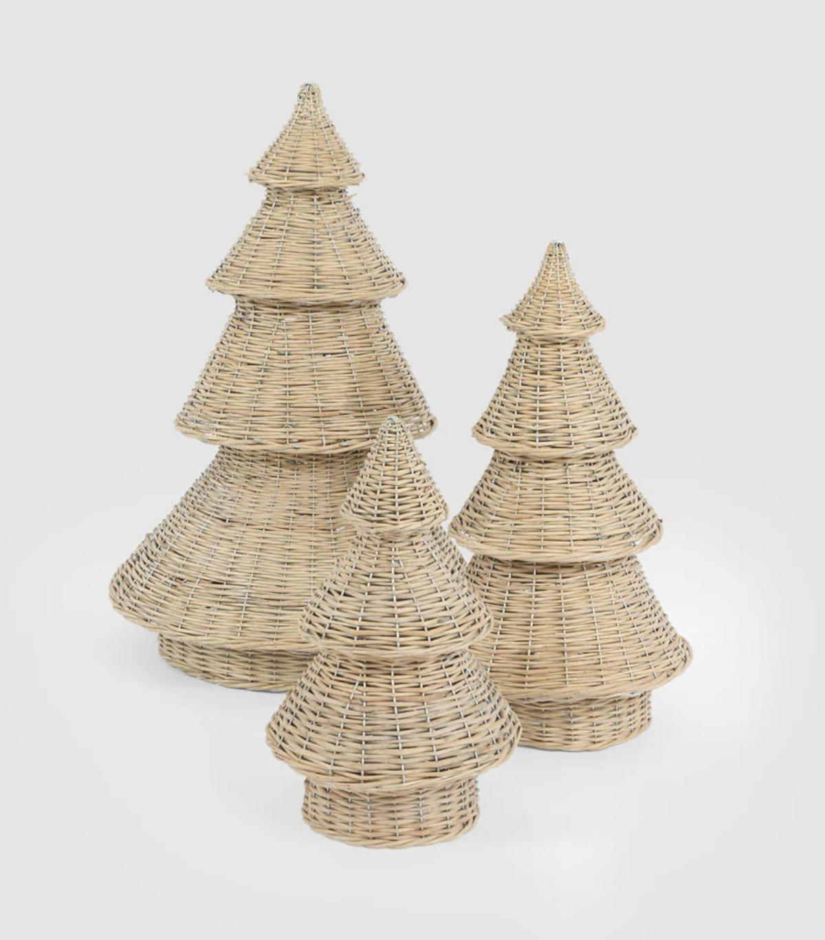 Three natural woven willow Christmas trees in different sizes