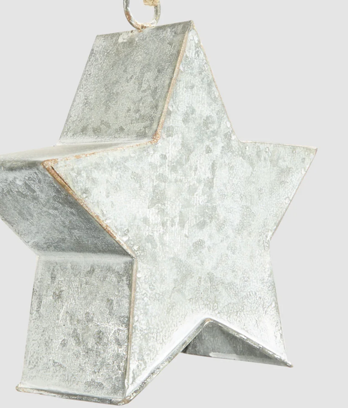 Large zinc star decoration with silver-grey finish and hanging cord