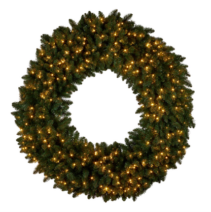 Green pine-style wreath illuminated with warm white LED lights