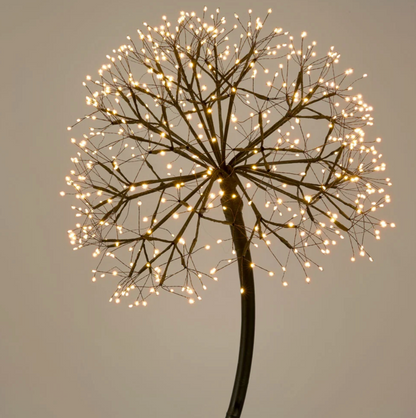 Close-up of the 150cm dandelion light head illuminated with warm white LEDs