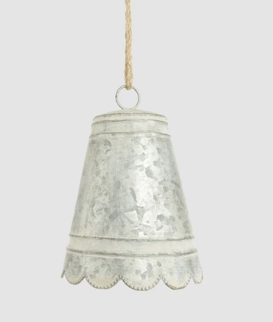 Small silver-grey zinc bell with scalloped edge and hanging cord