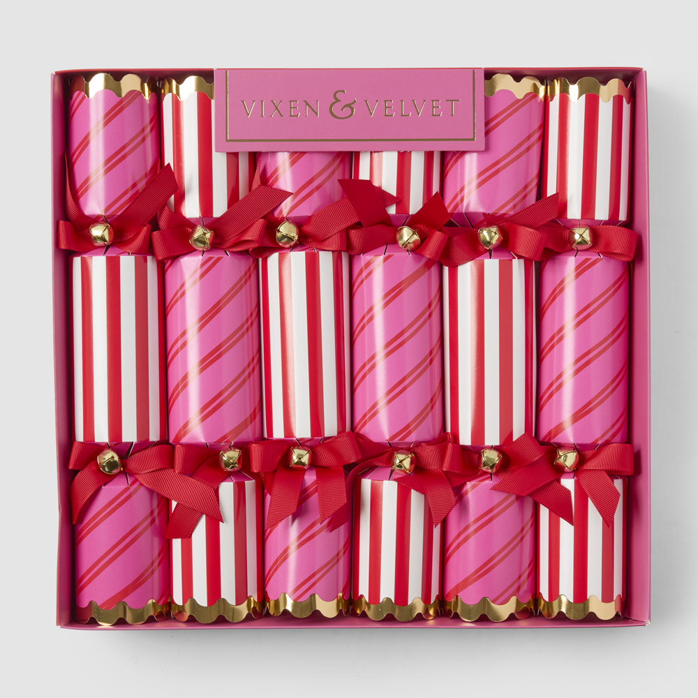 Red and pink striped Christmas crackers