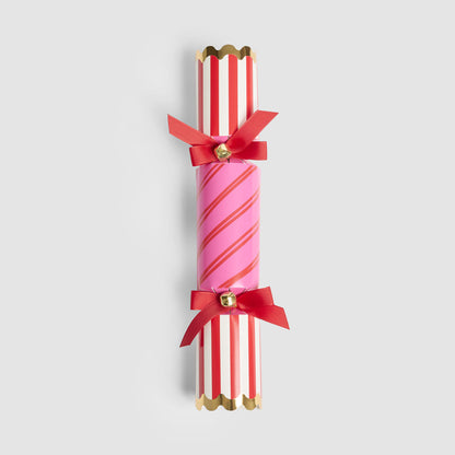 Red and pink striped Christmas crackers
