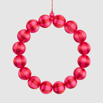 Large fuchsia and red striped bauble wreath