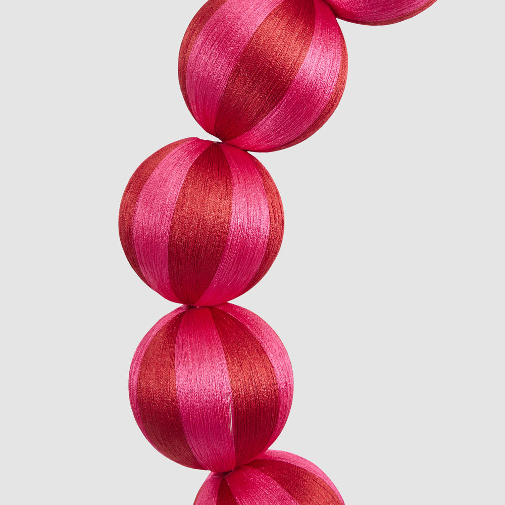 Large fuchsia and red striped bauble wreath