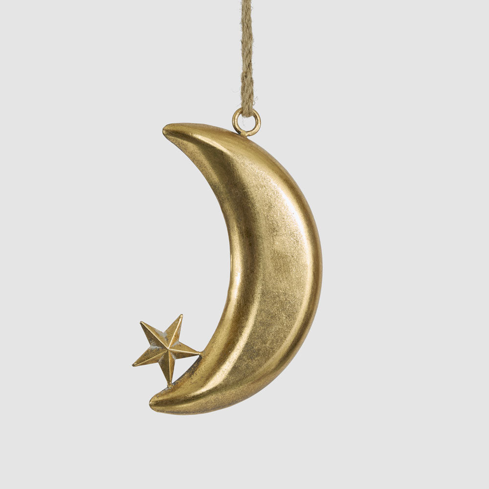 Small gold crescent moon hanging decoration with a small faceted star at the lower tip and natural hanging cord