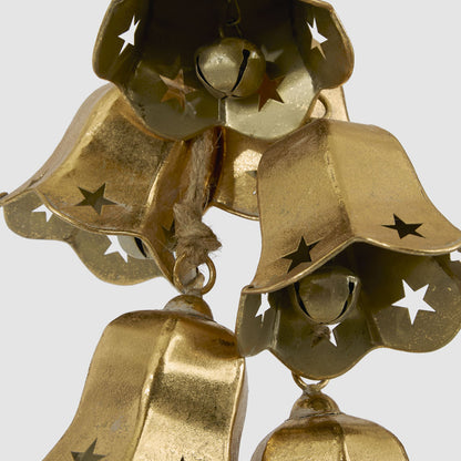 Close-up of the gold flower bells showing scalloped edges, star cut-outs and inner bells