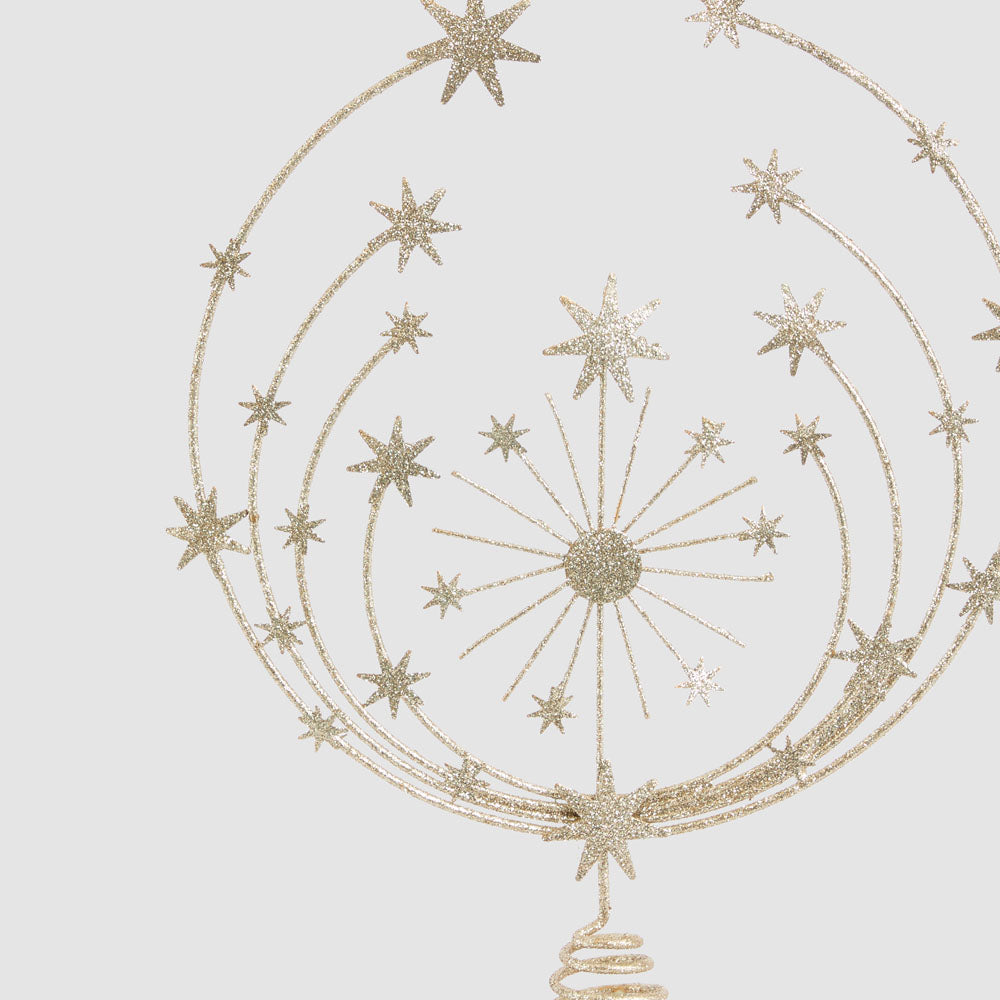 Close-up of the wire tree topper showing glittered stars, curved branches and central starburst