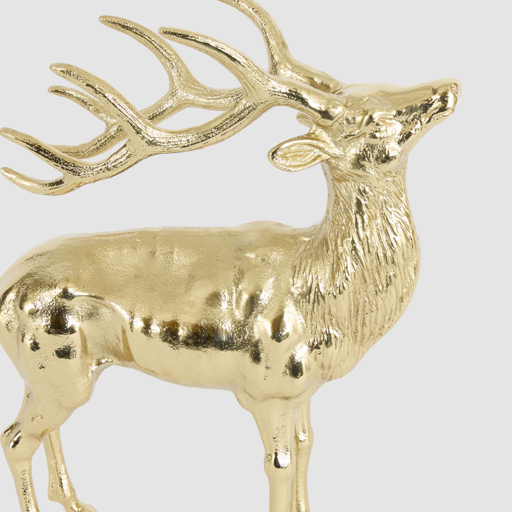 Large gold aluminium deer decoration close-up showing the head, antlers and textured gold finish