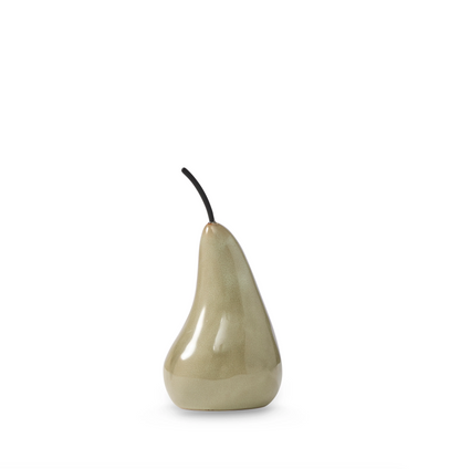 Small green ceramic pear sculpture with a glossy finish and dark curved stem
