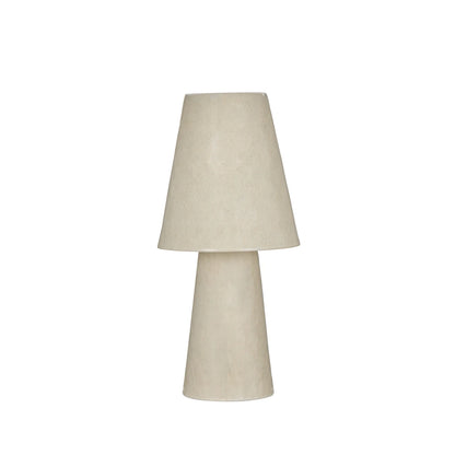 Textured rust ceramic table lamp on a white background