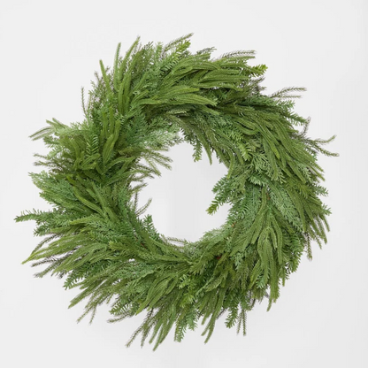 Front view of the mixed cypress wreath with layered green artificial foliage