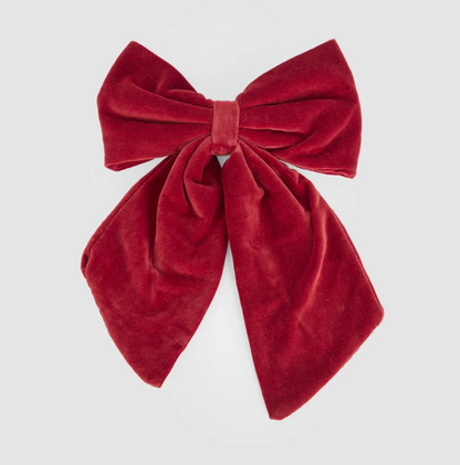 Red velvet bow with gathered loops, wrapped centre and two draped tails