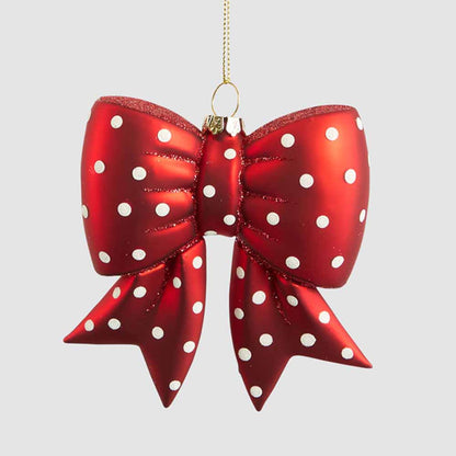 Red glass bow hanging decoration with white spots, glitter-edged folds and notched tails
