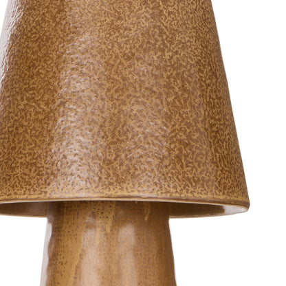 Close view of textured ivory reactive glaze on a ceramic lamp shade and base